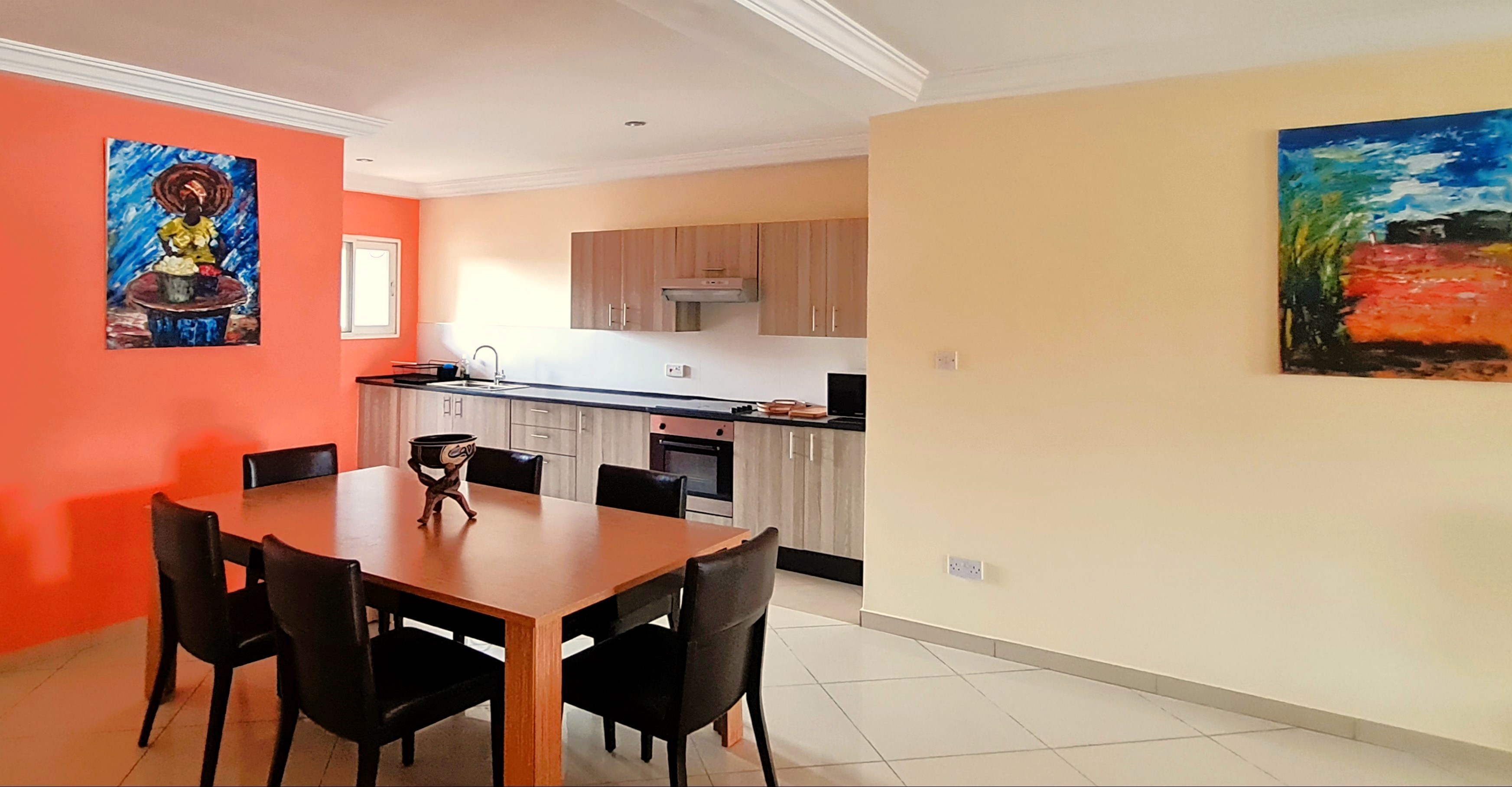 Open plan lounge in a furnished East Legon apartment